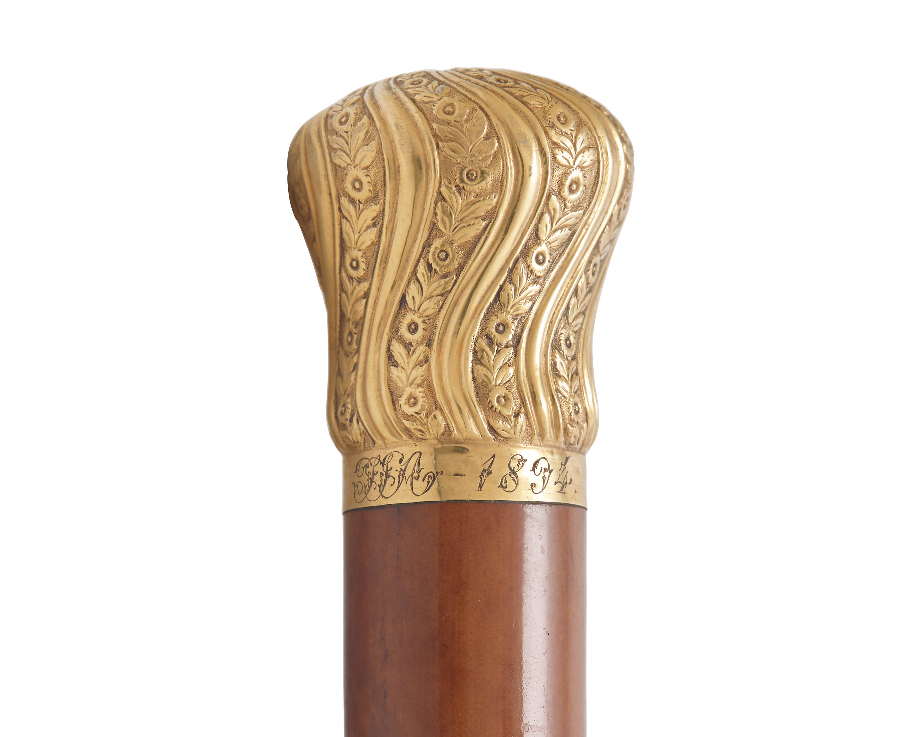 A Gold-Mounted Walking Stick Monogrammed for John Jacob Astor IV (1864-1912)