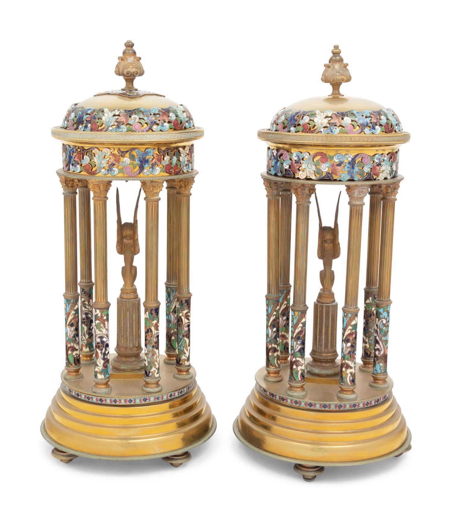 A Pair of French Gilt Bronze and Champlevé Enamel Stands with Interior Sphinxes
