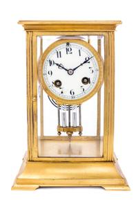 A French Gilt Metal Regulator Clock Height 8 3/4 inches. — 19TH/20TH CENTURY