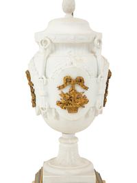 A Pair of Continental Bisque Porcelain Urns with Gilt Metal Mounts