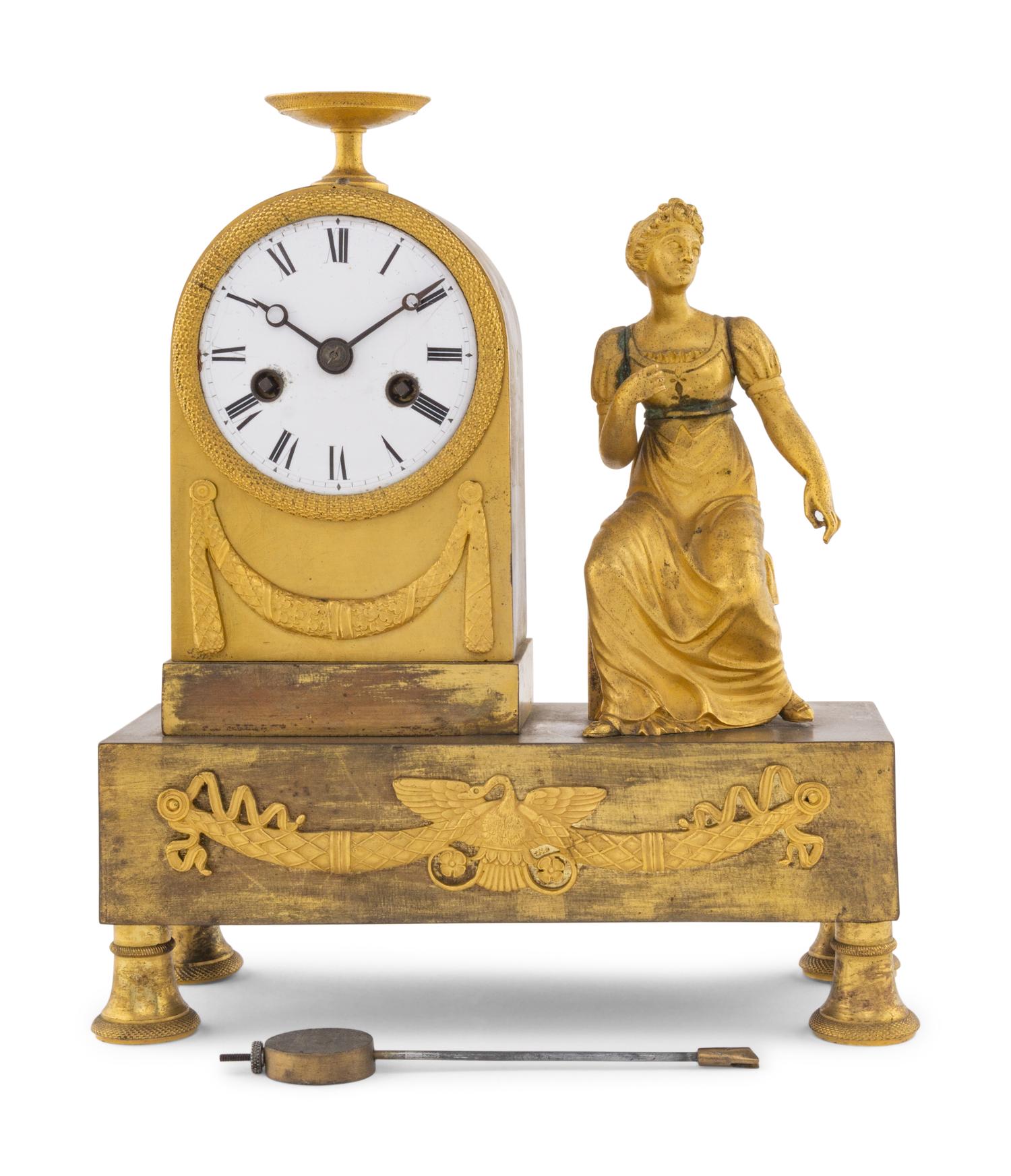 An Empire Gilt Bronze Clock