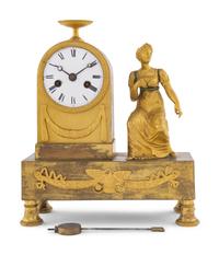 An Empire Gilt Bronze Clock