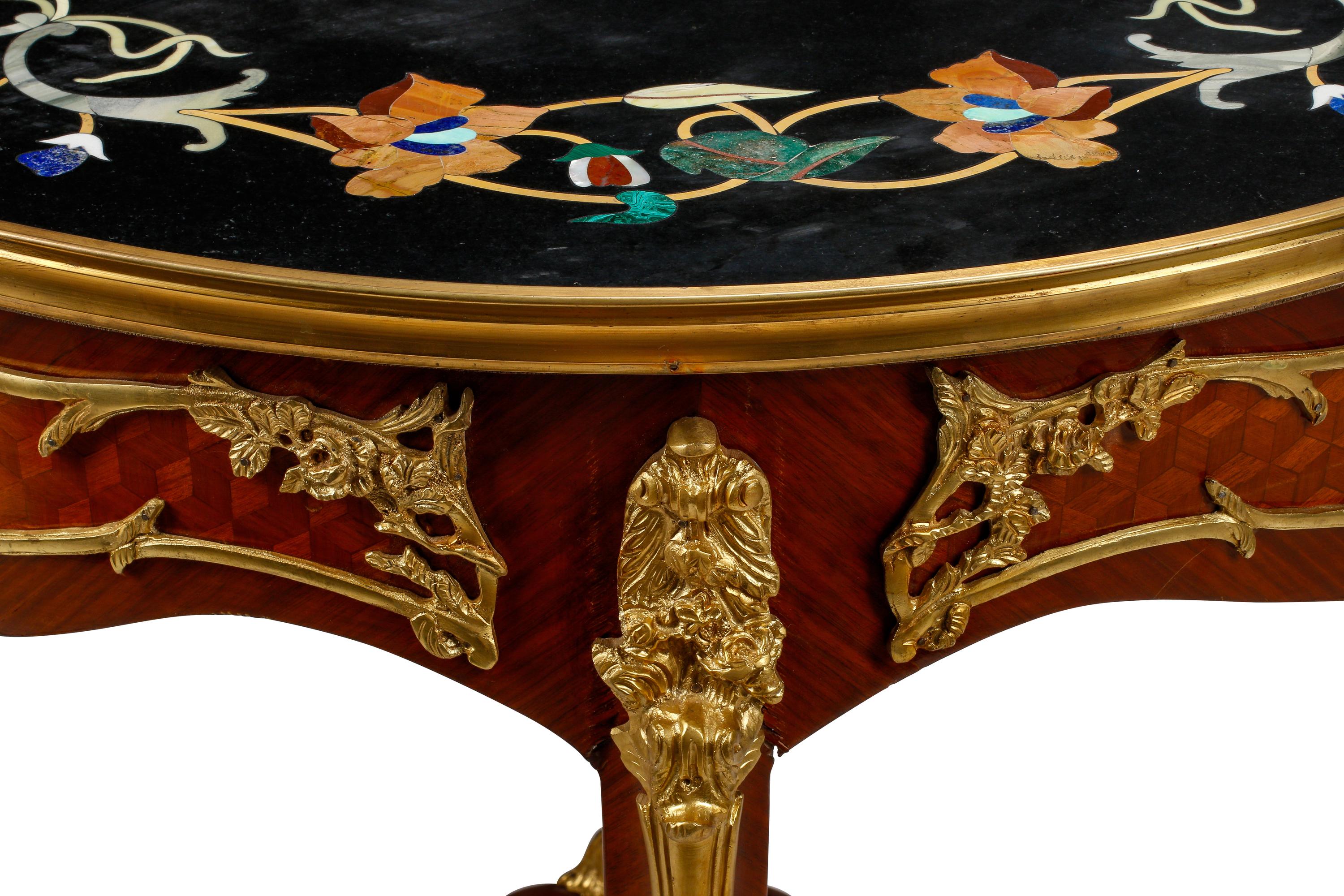 A Louis XV Style Parquetry, Specimen Marble and Gilt Bronze Mounted Table