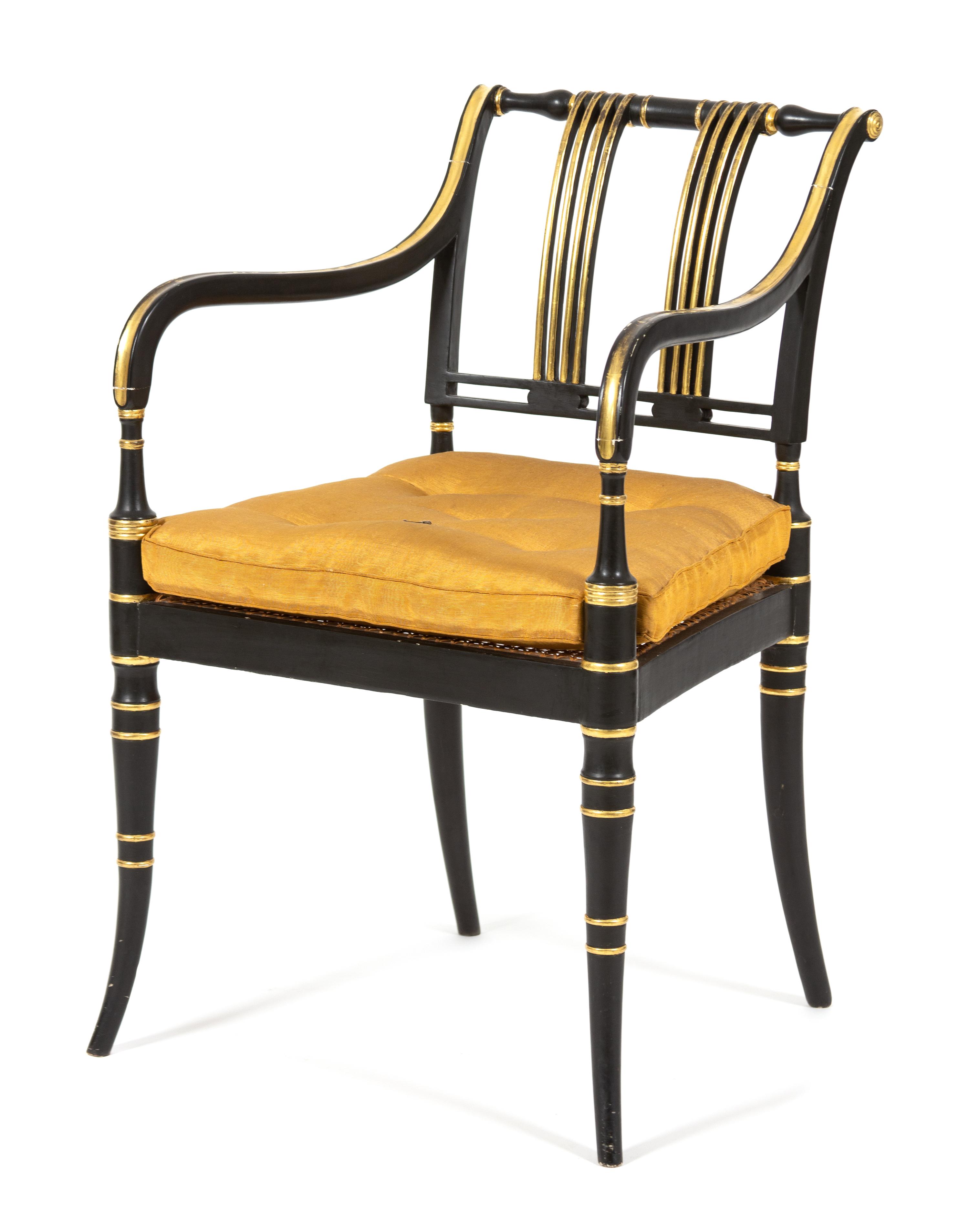 A Regency Ebonized and Gilt Decorated Open Armchair Height 32 x width 20 x depth 18 inches. — 19TH CENTURY