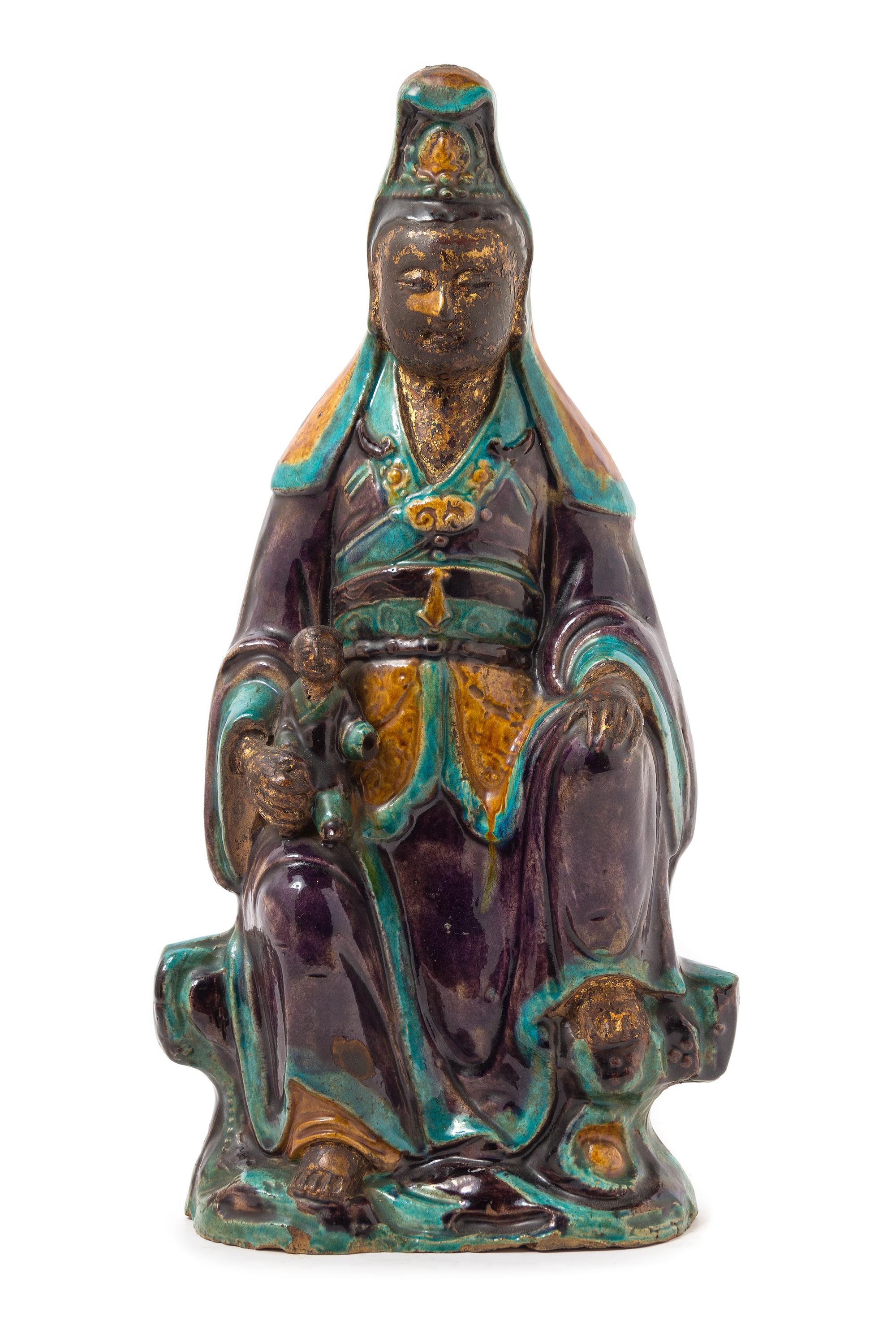 A Chinese Fahua Stoneware Figure of Avalokitesvara MING DYNASTY Height 16 1/4 inches. — MING DYNASTY