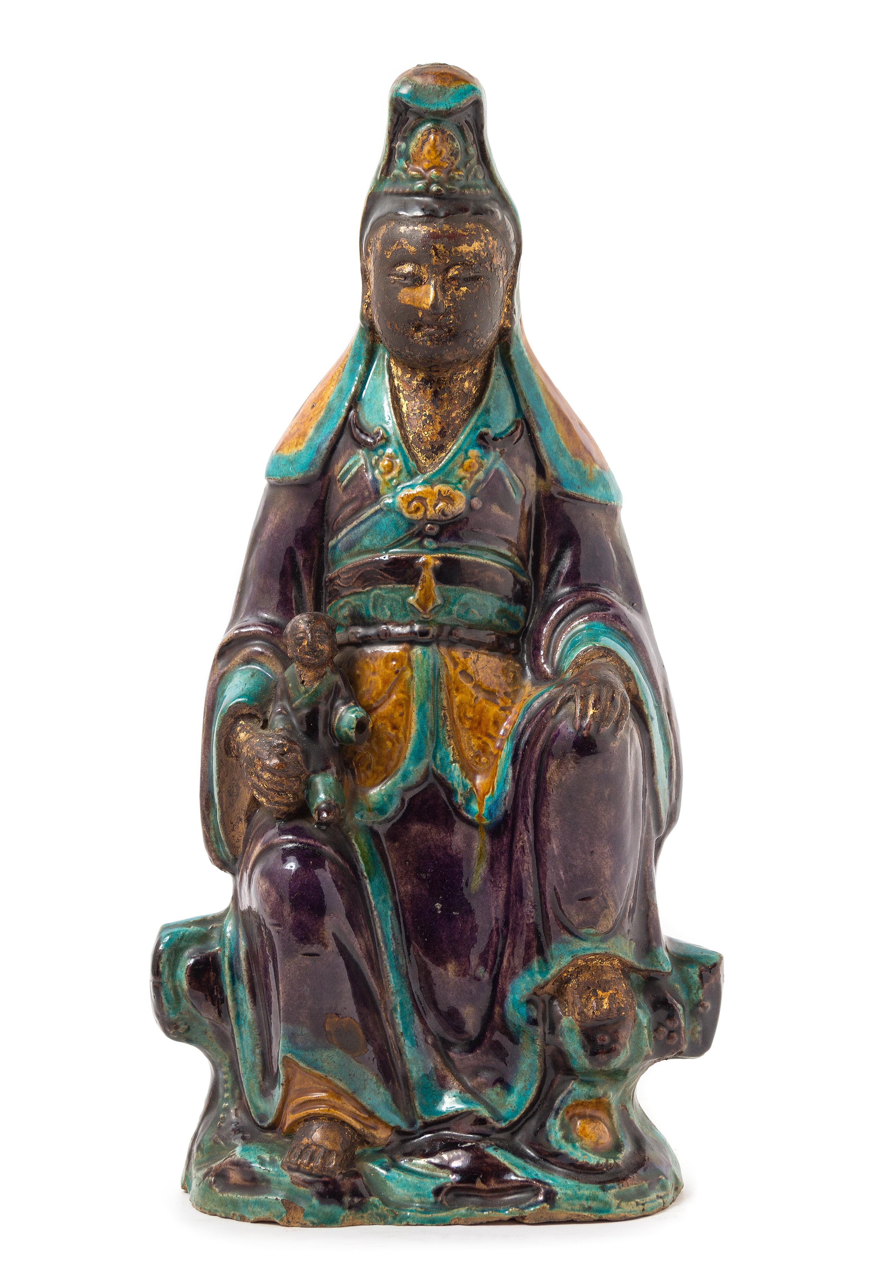 A Chinese Fahua Stoneware Figure of Avalokitesvara MING DYNASTY Height 16 1/4 inches. — MING DYNASTY
