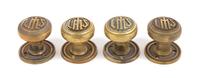 Clarence Hatzfeld, (American, 1873-1945), a set of four interior monogrammed door knobs from the Logan Square Masonic Temple, Chicago,