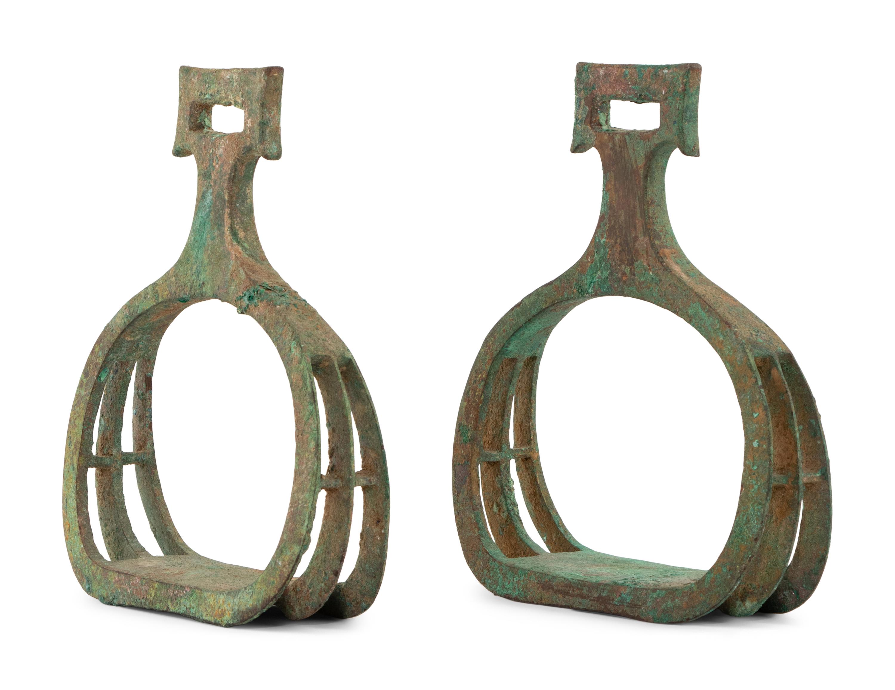 A Chinese Bronze Pair of Stirrups