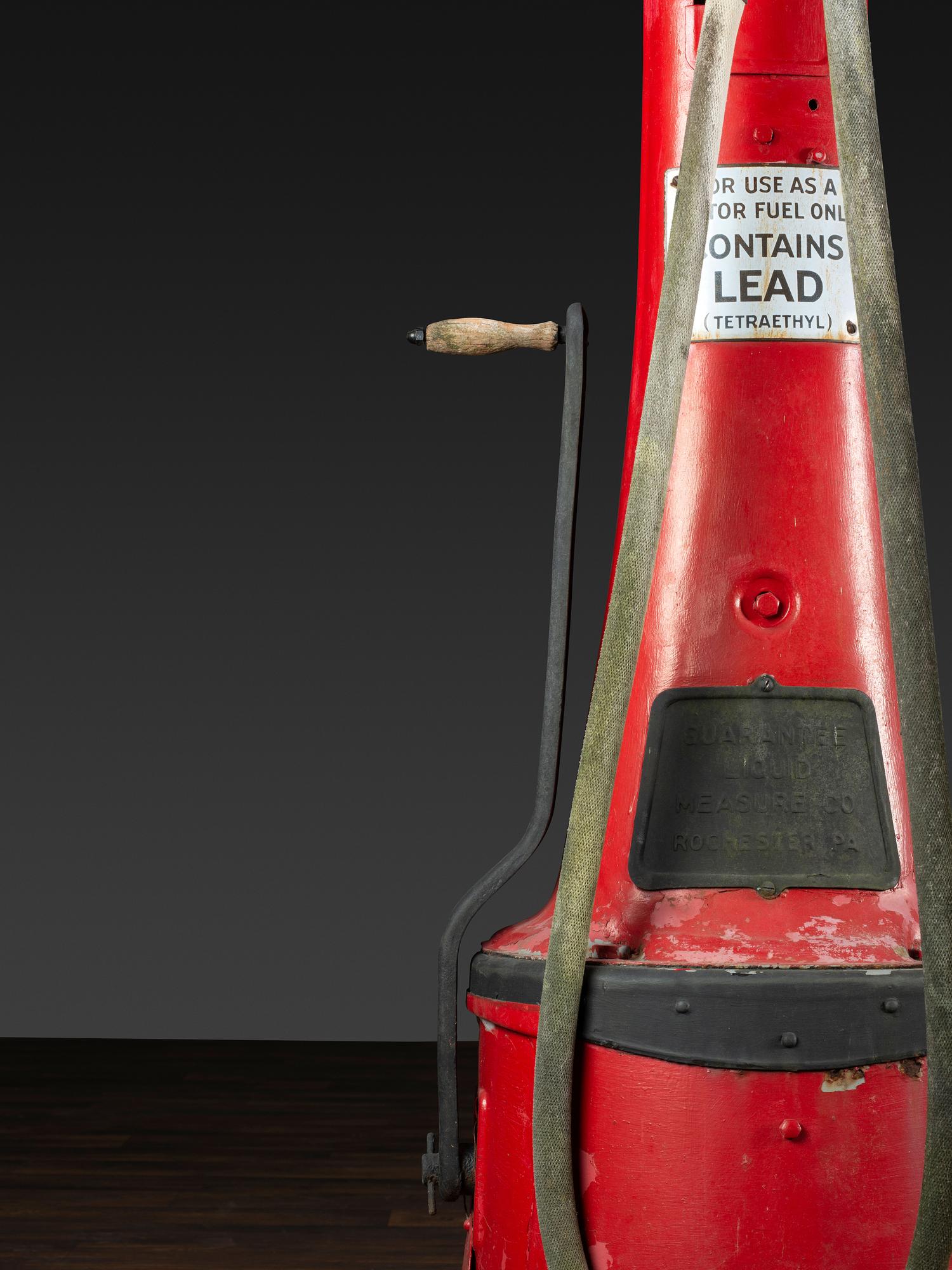 An American Painted Metal Gravity Gas Pump, Guarantee Liquid Measure