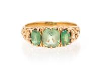 An Antique 18 Karat Yellow Gold, Peridot and Emerald Ring, 2.80 dwts.