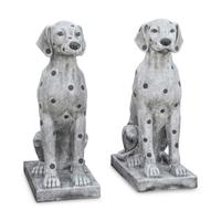 A Pair of Continental Marble-Inlaid Granite Seated Dogs