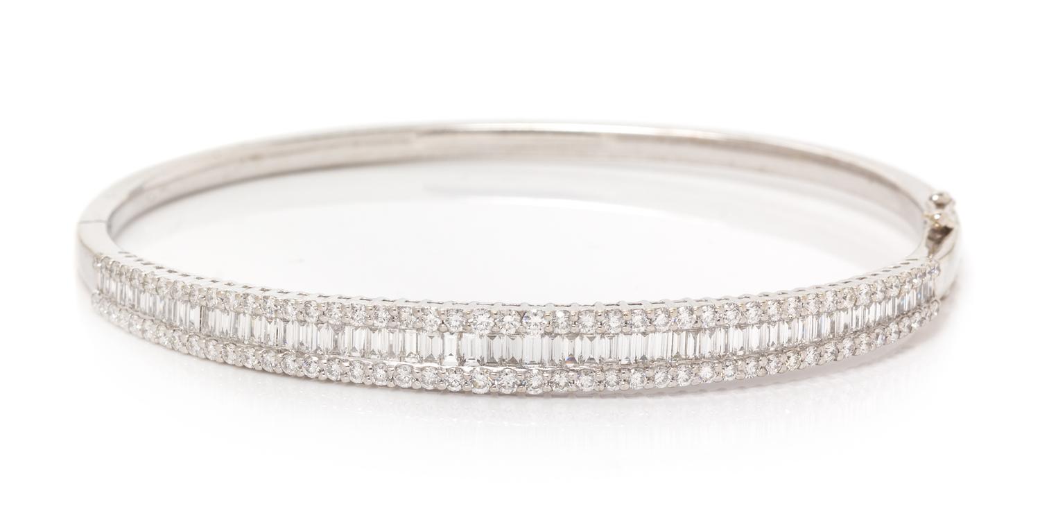 A White Gold and Diamond Bangle Bracelet, 9.60 dwts.