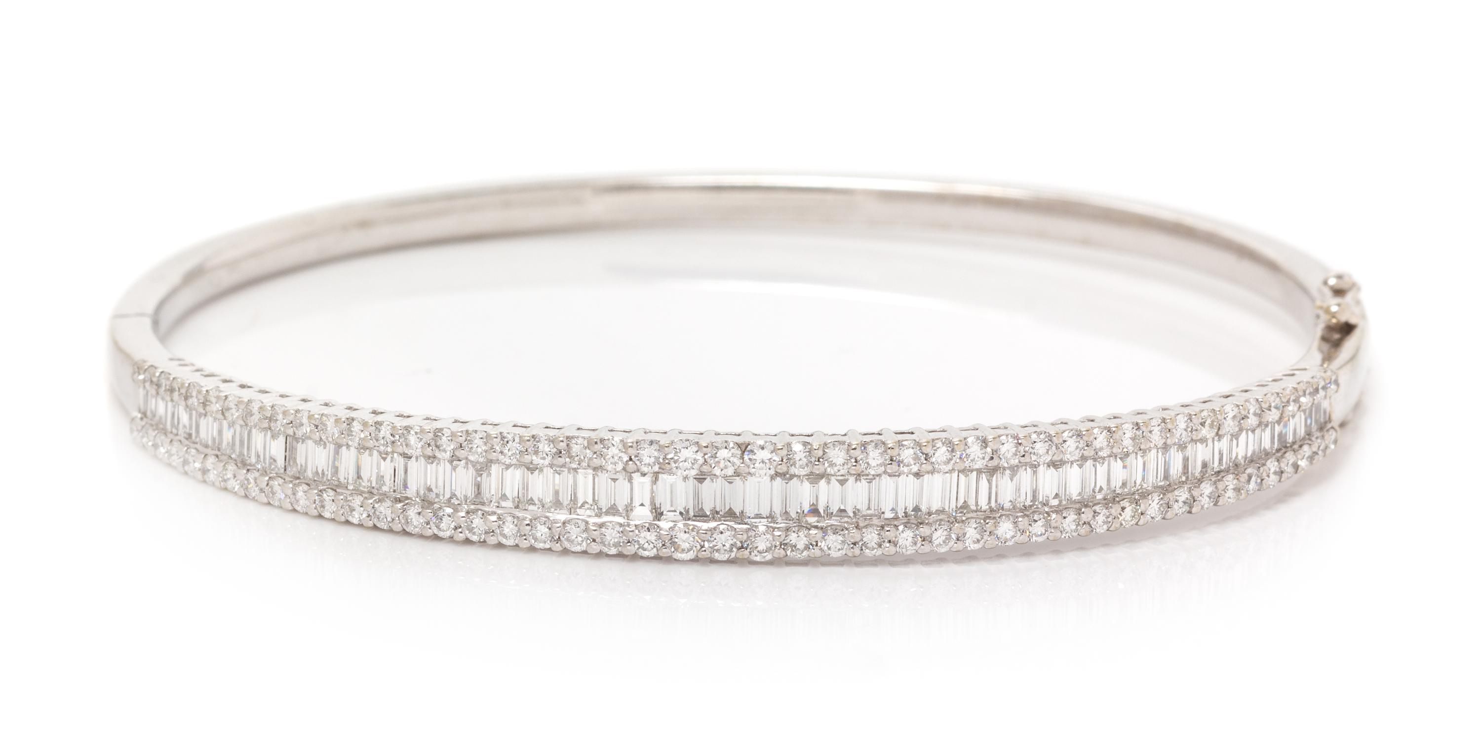 A White Gold and Diamond Bangle Bracelet, 9.60 dwts.