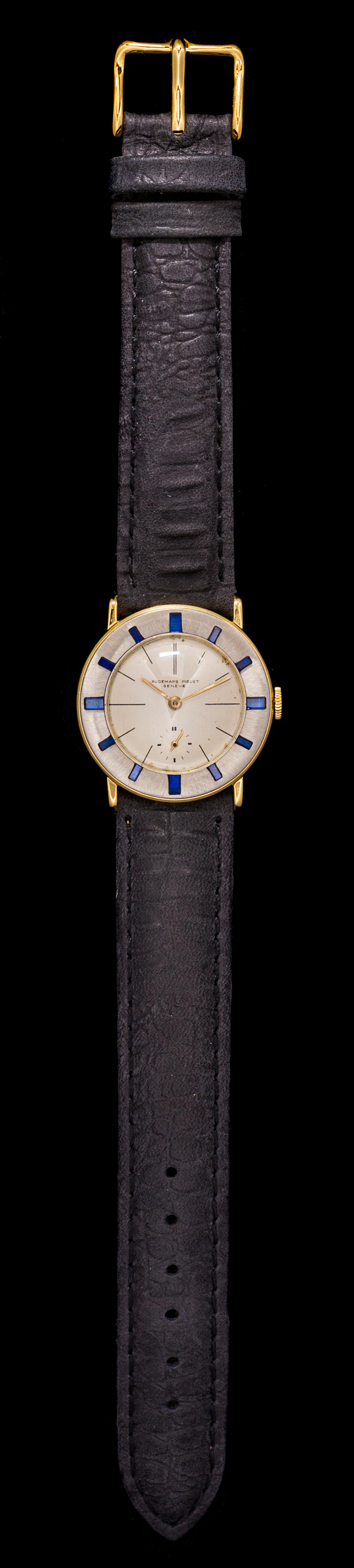 An 18 Karat Bicolor Gold and Sapphire Wristwatch, Audemars Piguet,