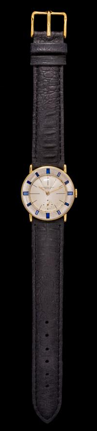 An 18 Karat Bicolor Gold and Sapphire Wristwatch, Audemars Piguet,