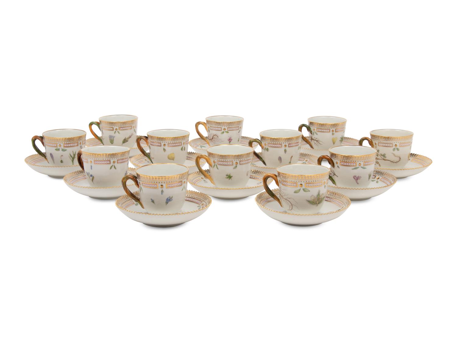 A Set of Twelve Royal Copenhagen Flora Danica Porcelain Teacups and Saucers