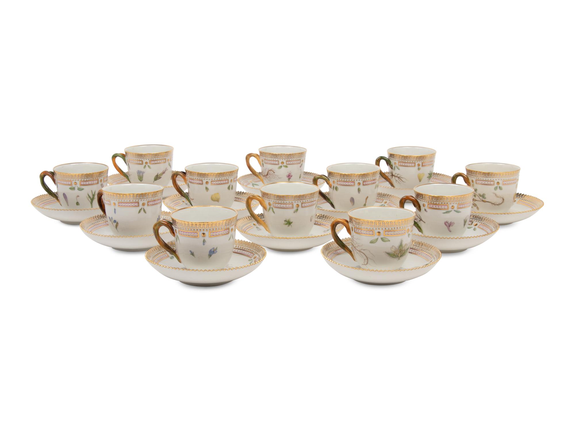 A Set of Twelve Royal Copenhagen Flora Danica Porcelain Teacups and Saucers