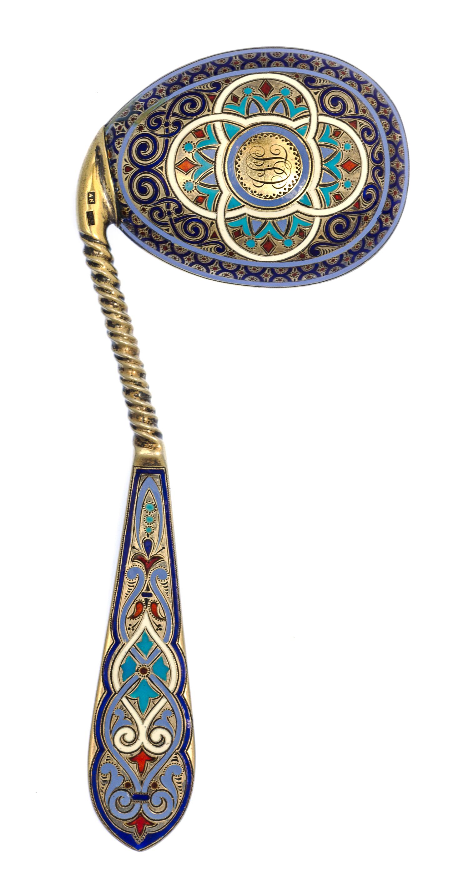 A Russian Silver-Gilt and Enamel Caddy Spoon, Mark of Antip Kuzmichev, Moscow, late 19th century, the handle having polychrome vine ena