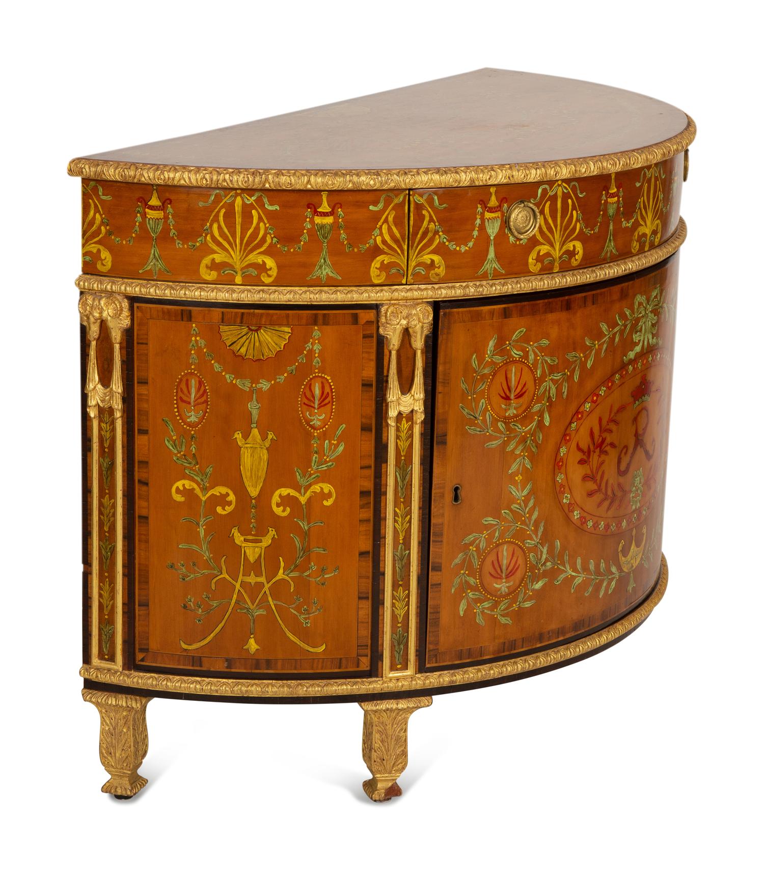 A Pair of Adam Style Painted Parcel Gilt and Marquetry Inlaid Demilune Commodes