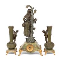 A French Patinated Cast Metal and Onyx Clock Garniture