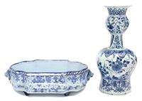 A Delft Earthenware Vase Height 14 inches.