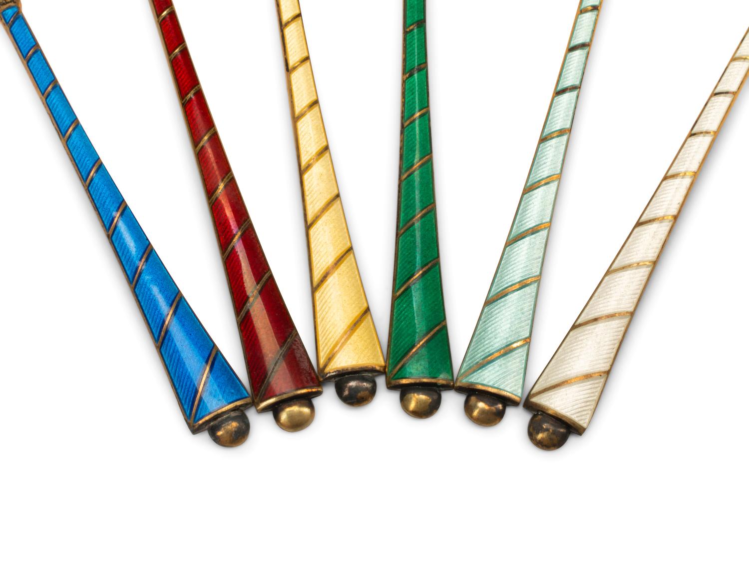 A Collection of Northern European Enameled Silver Spoons