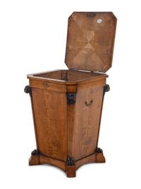 A Massive Regency Parcel Ebonized Mahogany Cellarette
