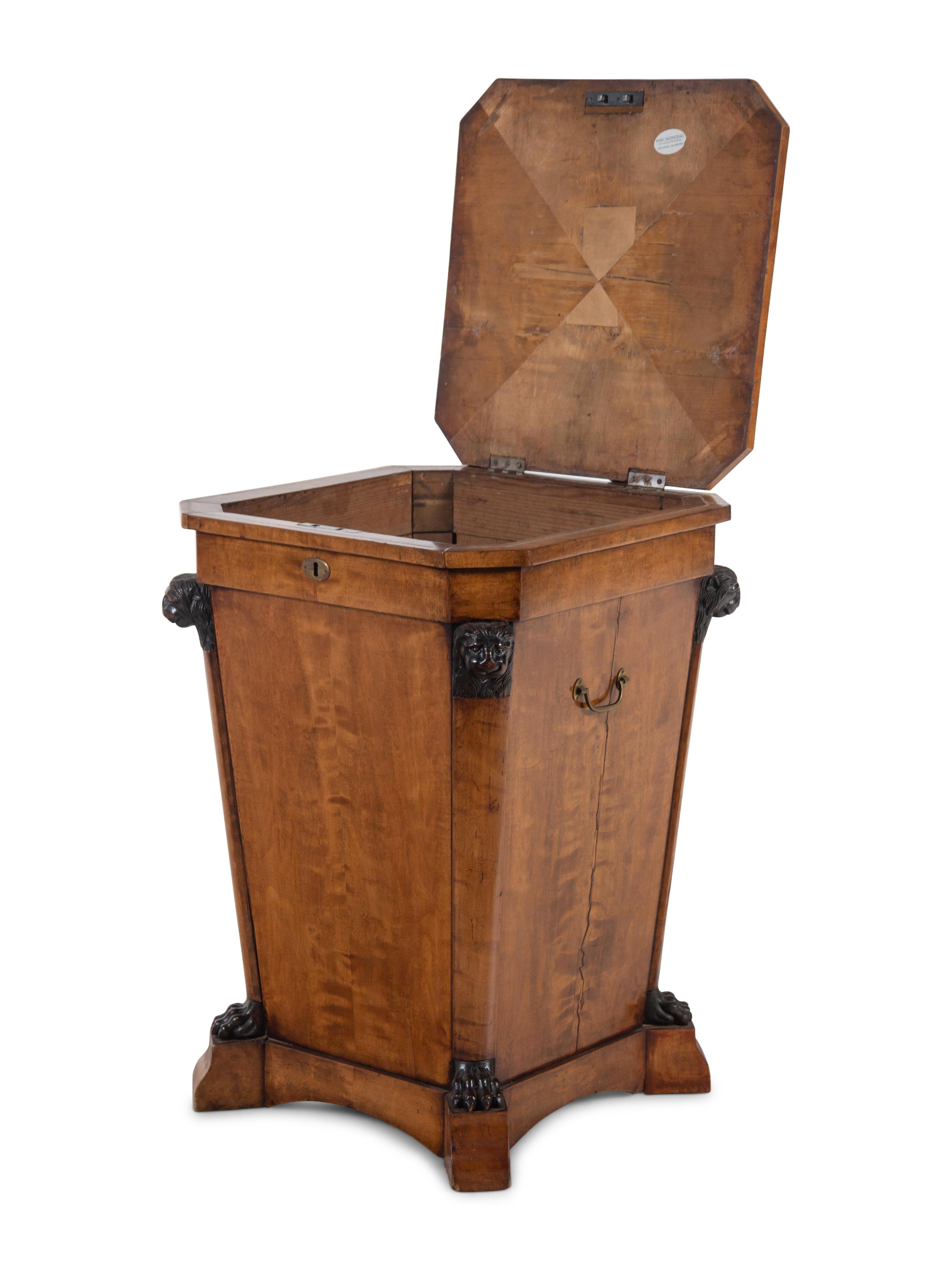 A Massive Regency Parcel Ebonized Mahogany Cellarette