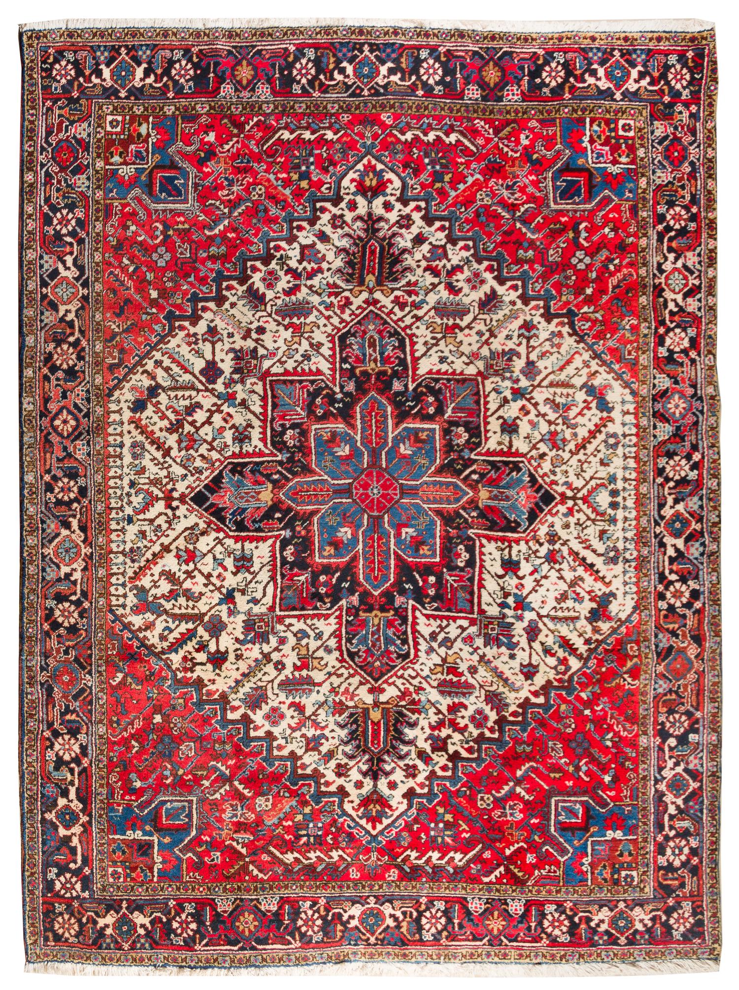 A Heriz Wool Rug 10 feet 1 inch x 8 feet 4 inches. — CIRCA 1910