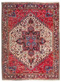 A Heriz Wool Rug 10 feet 1 inch x 8 feet 4 inches. — CIRCA 1910