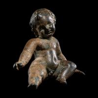 A Roman Bronze Seated Child