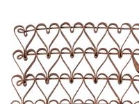 A Wrought-Iron Linked Heart Floor Mat