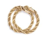 A Pair of 14 Karat Yellow Gold Bracelets, 26.10 dwts.