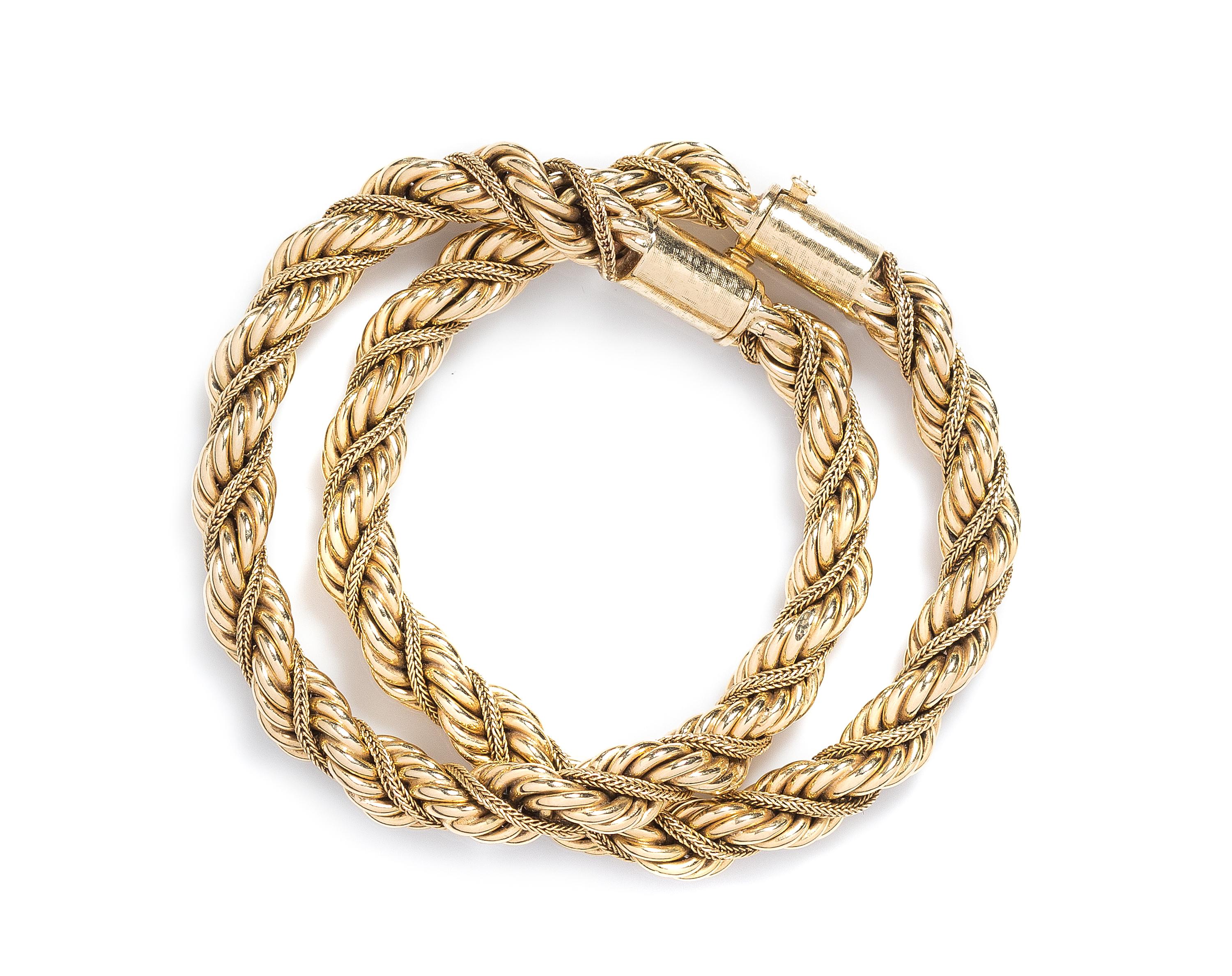 A Pair of 14 Karat Yellow Gold Bracelets, 26.10 dwts.