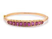 A Yellow Gold, Ruby and Diamond Bangle Bracelet,