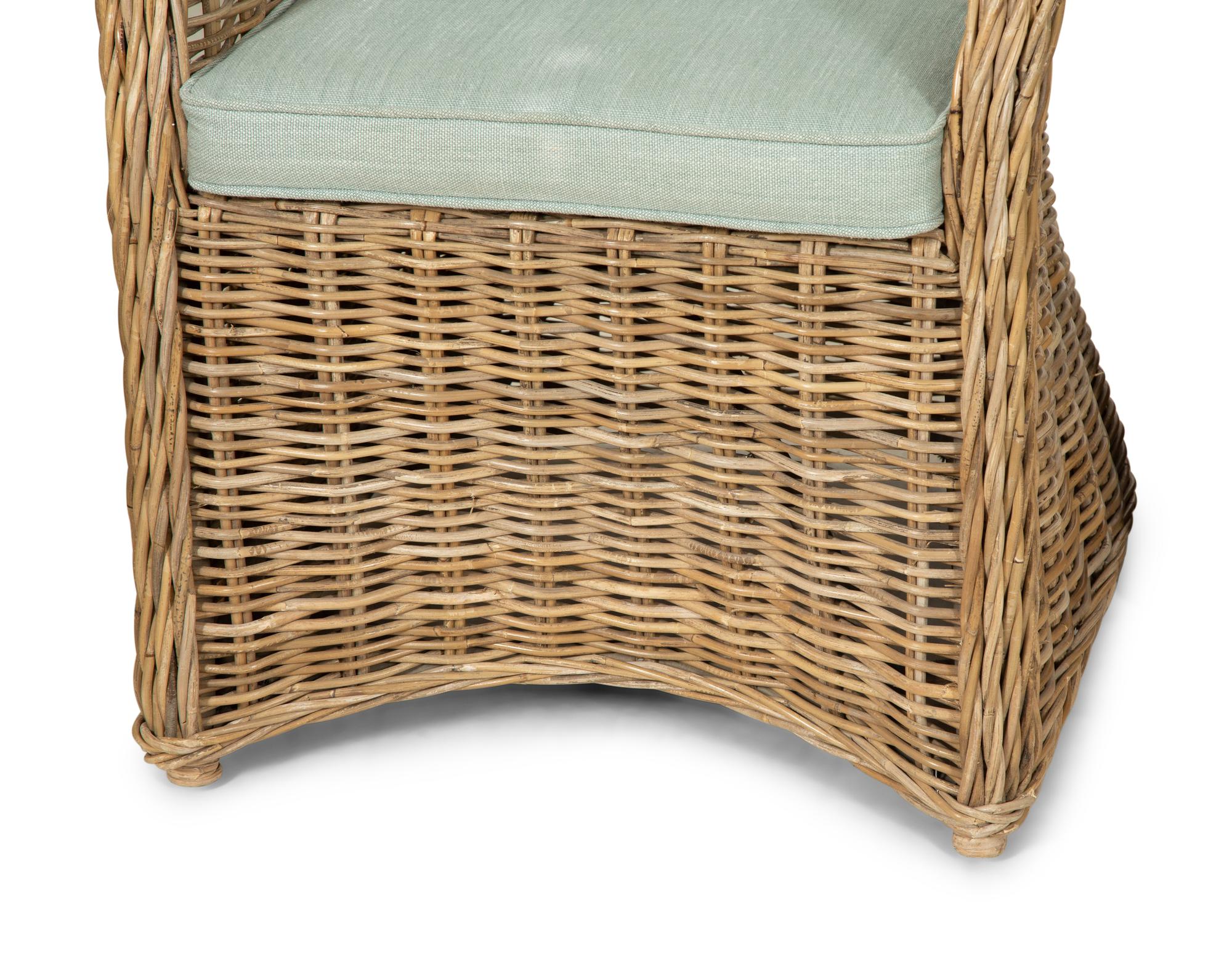 A Set of Four Rattan Armchairs with Seat and Back Cushions