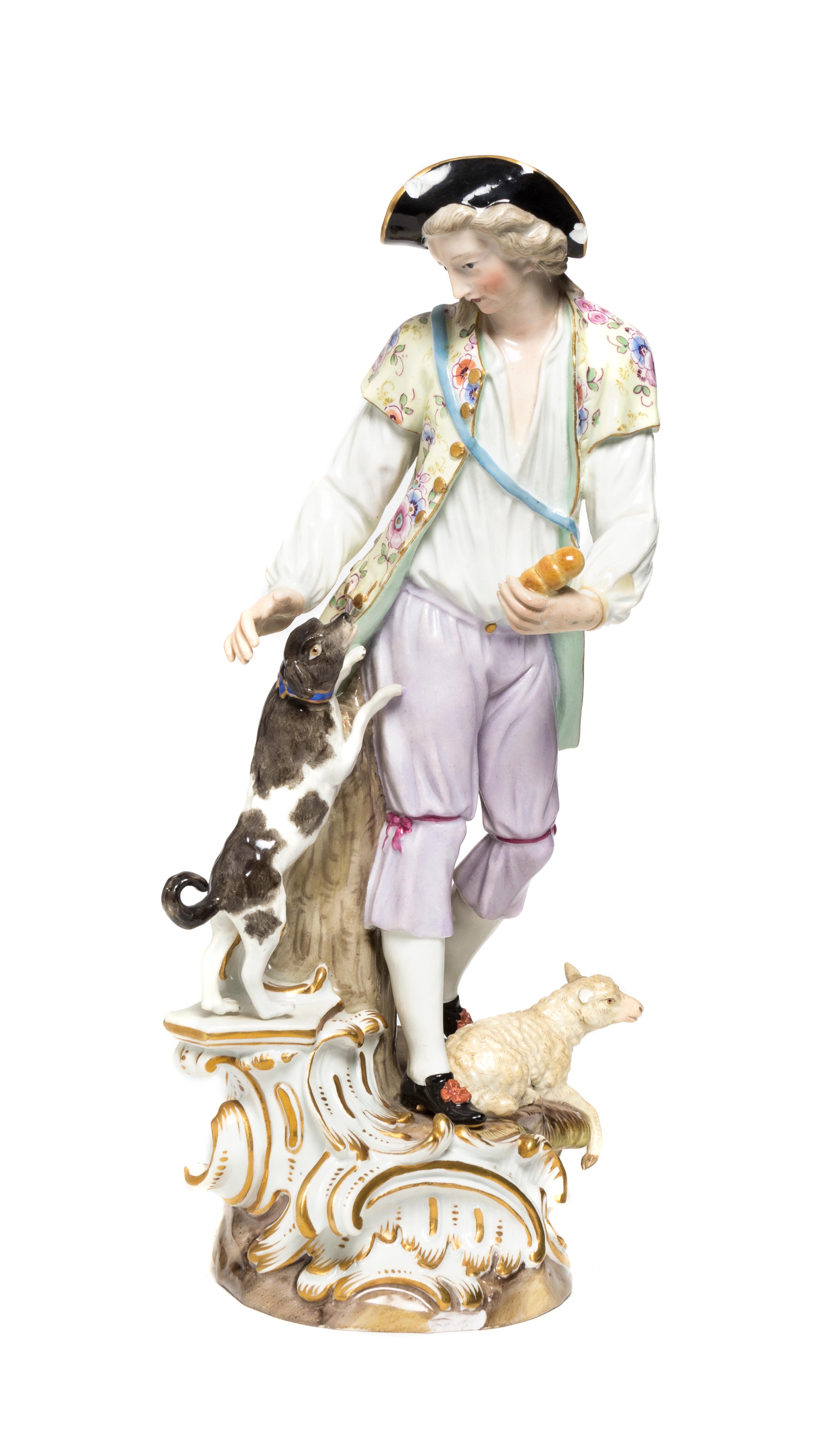 A Meissen Porcelain Figural Group, Height 11 1/4 inches.