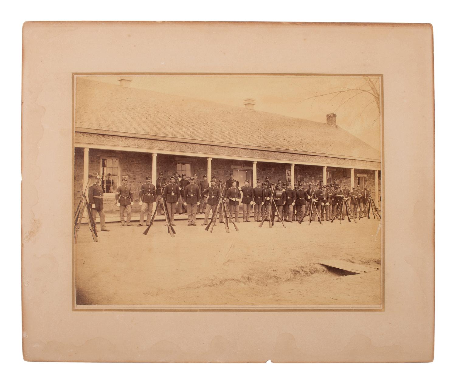 [LATE INDIAN WARS]. [MCKAY, William, photog., attrib.]. 2 photographs of US soldiers near barracks.