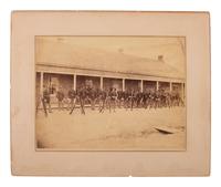 [LATE INDIAN WARS]. [MCKAY, William, photog., attrib.]. 2 photographs of US soldiers near barracks.