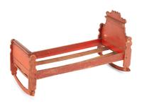 A Scandinavian Painted Pine Doll's Bed