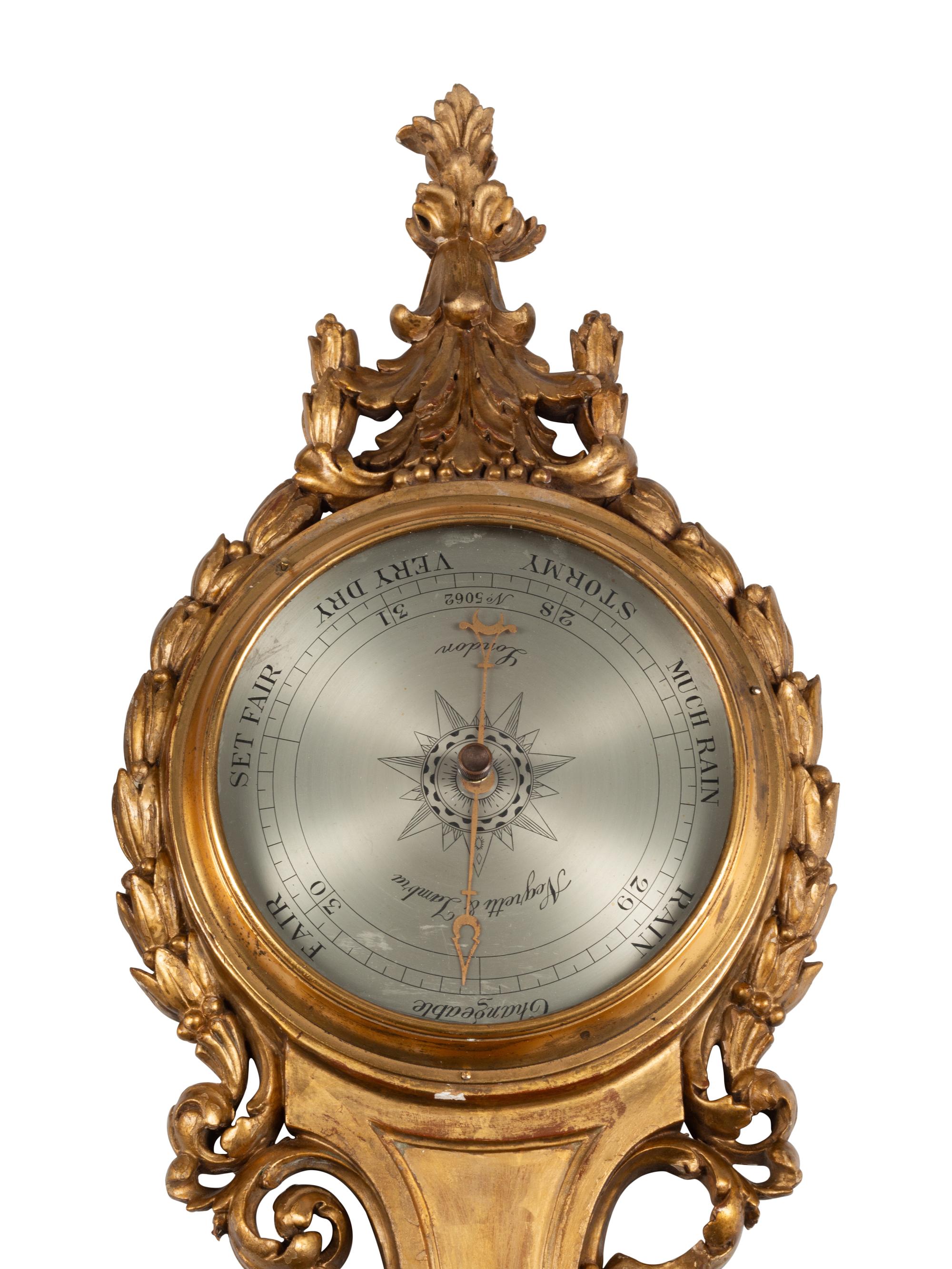 A French Carved Giltwood Clock and Barometer