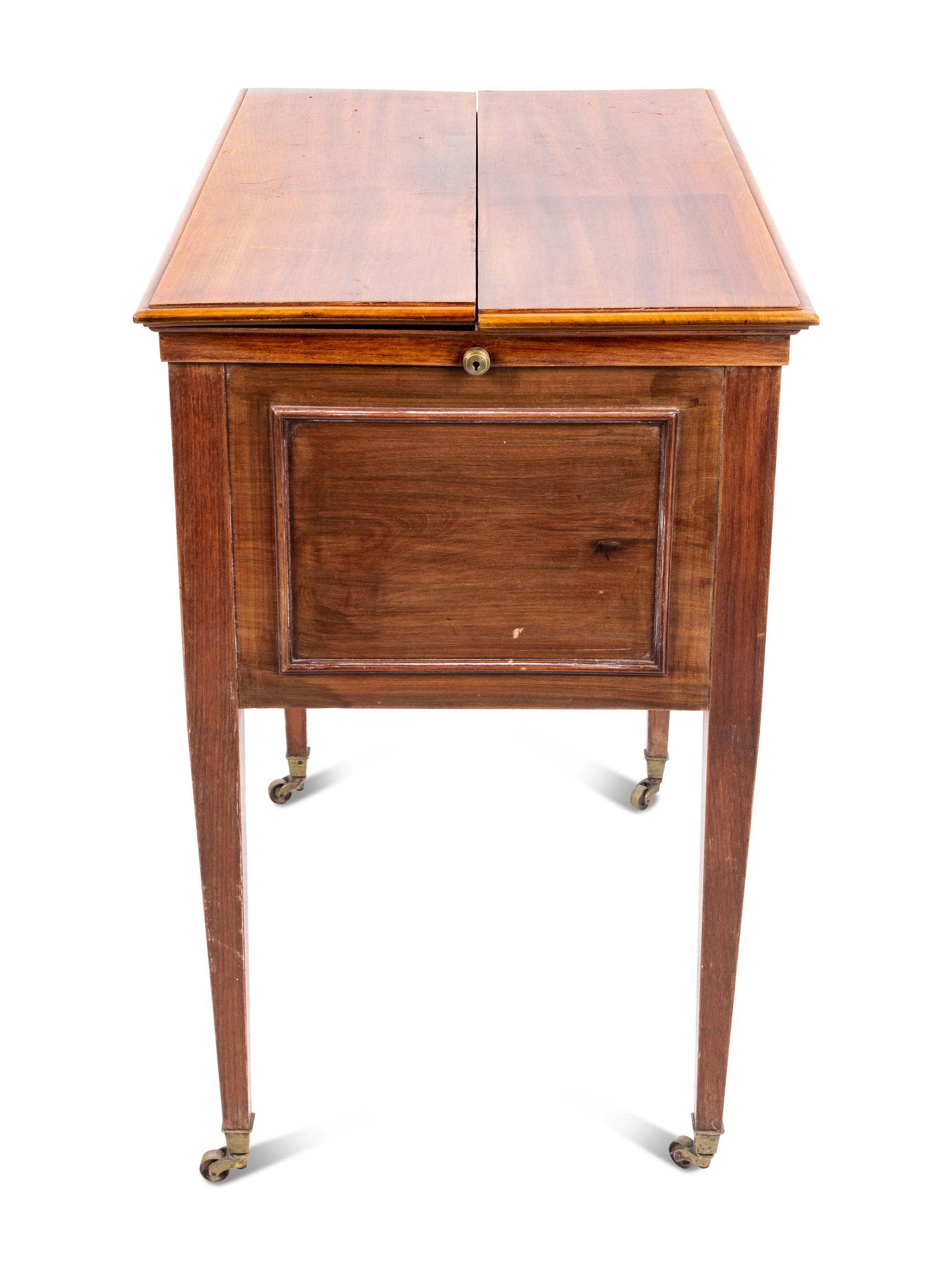 An English Mahogany and Cut Glass Liquor Cabinet by Waring & Gillow Ltd.