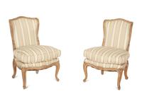 A Pair of Louis XV Style Carved Fruitwood Slipper Chairs
