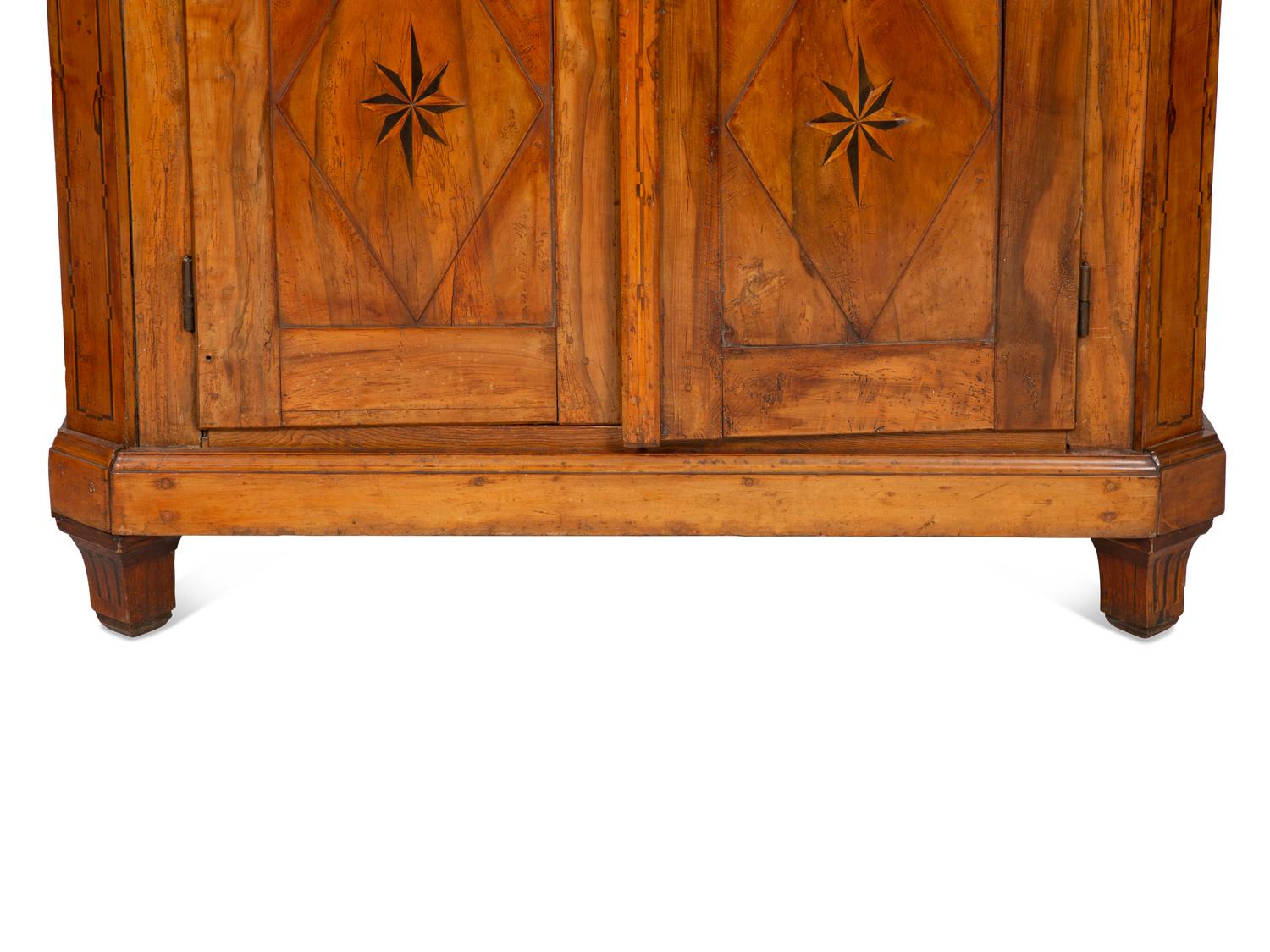 A Continental Olivewood Armoire