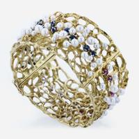 An 18K Yellow Gold and Gemstone Bangle by Karl Stittgen