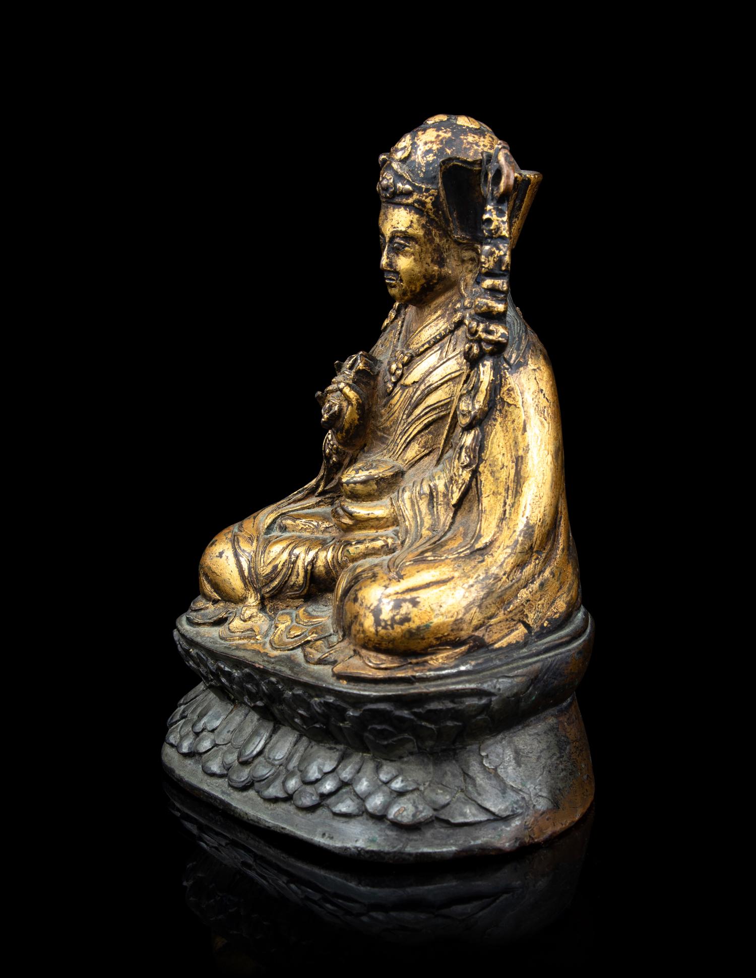 A Tibetan Parcel Gilt Bronze Figure of Guru