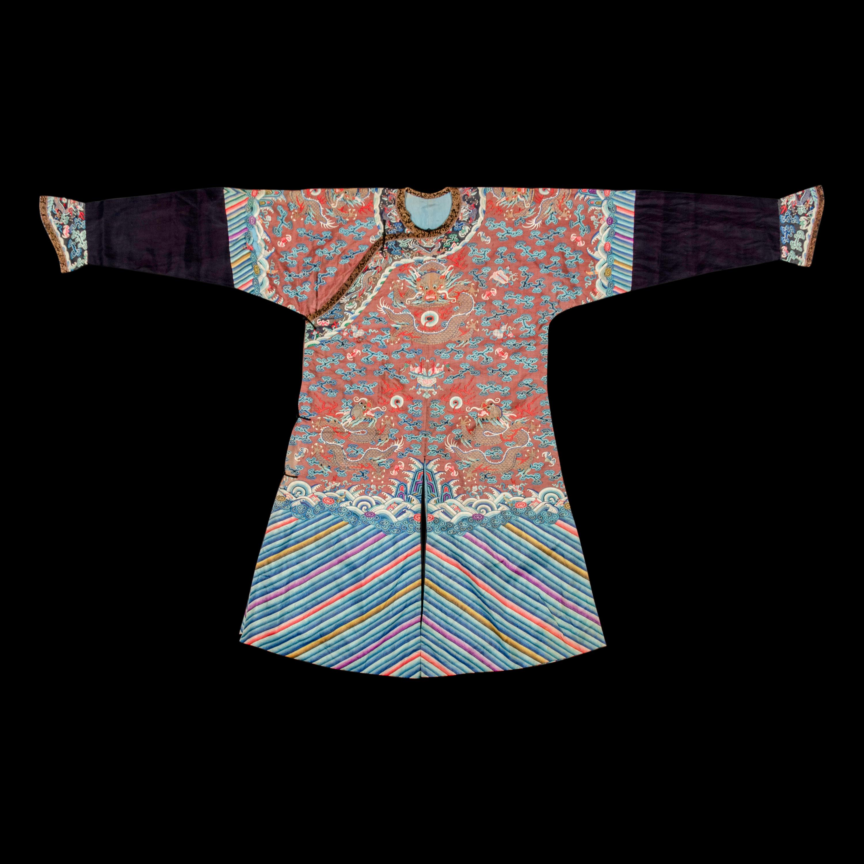 A Chinese Brown Ground Kesi Silk 'Dragon' Robe, Jifu, 19th Century 清晚期 醬地緙絲雲龍紋吉服