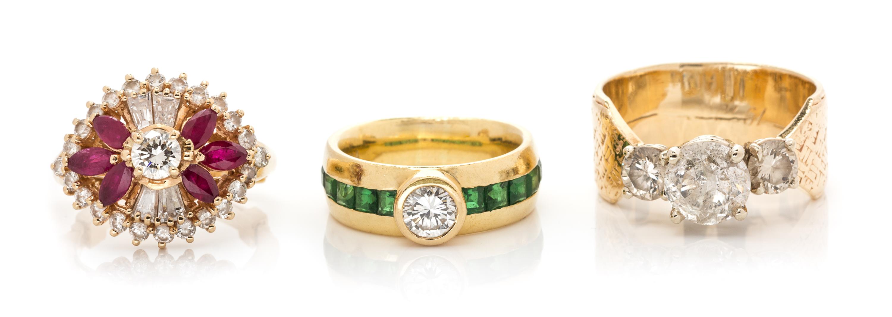 A Collection of Yellow Gold, Diamond, Tsavorite Garnet and Ruby Rings, 17.00 dwts.