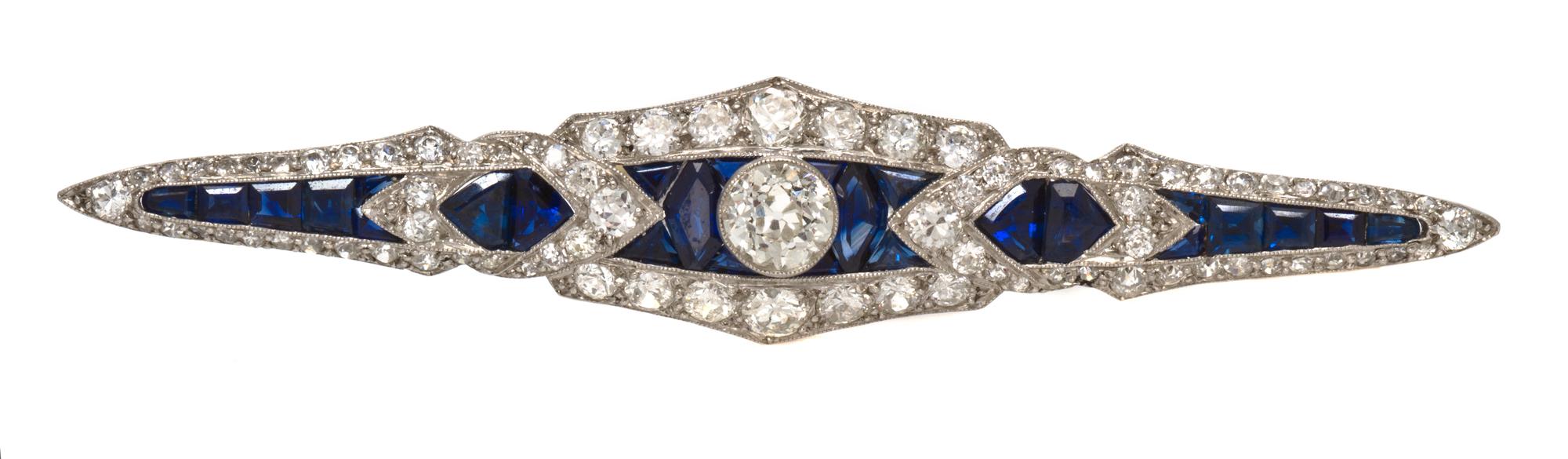 An Art Deco Platinum, Diamond and Sapphire Bar Brooch, 5.90 dwts.