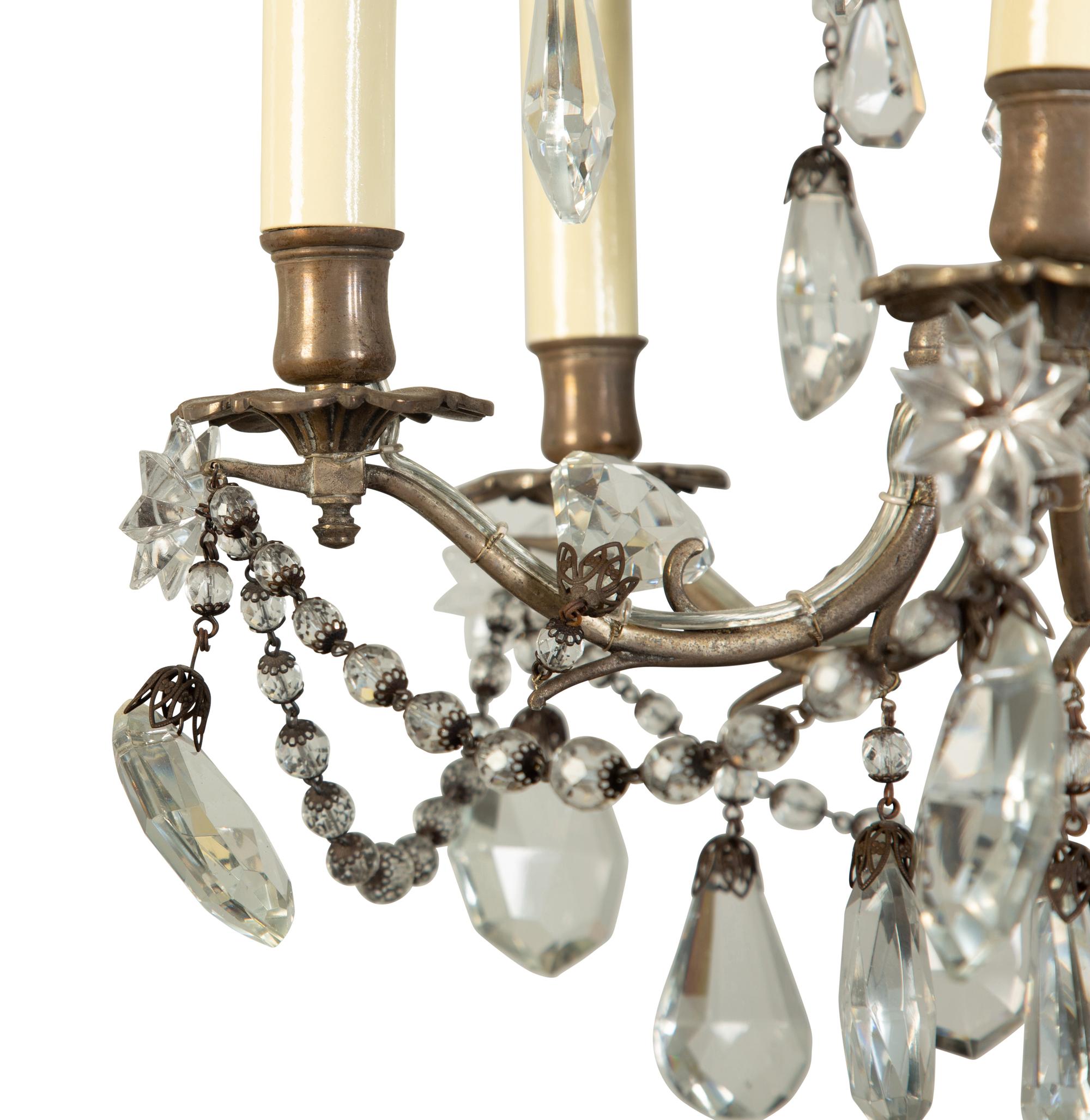 A Silvered Metal Six-Light Chandelier